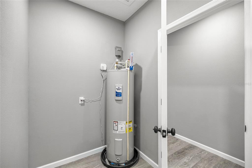 15010 Northeast 3rd Place Williston, FL 32696 - Photo 23 of 32 a view of water heater room