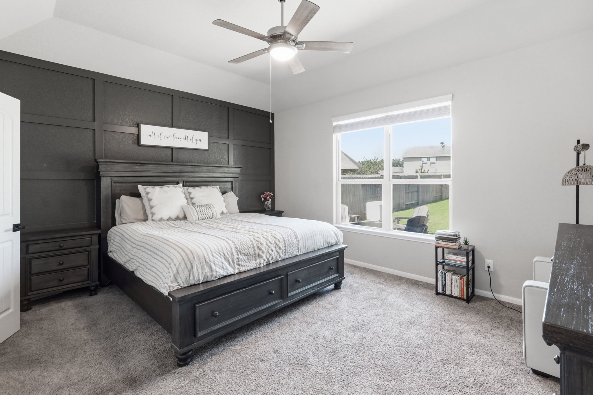 4334 Umber Shadow Drive Spring, TX 77386 - Photo 4 of 45 Primary bedroom offers generous proportions, elevated ceilings, natural light, and a striking accent wall for added character.
