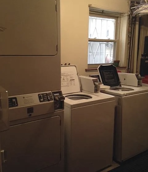 2113 West Montrose Avenue, Unit 2F Chicago, IL 60618 - Photo 8 of 8 a utility room with dryer and washer