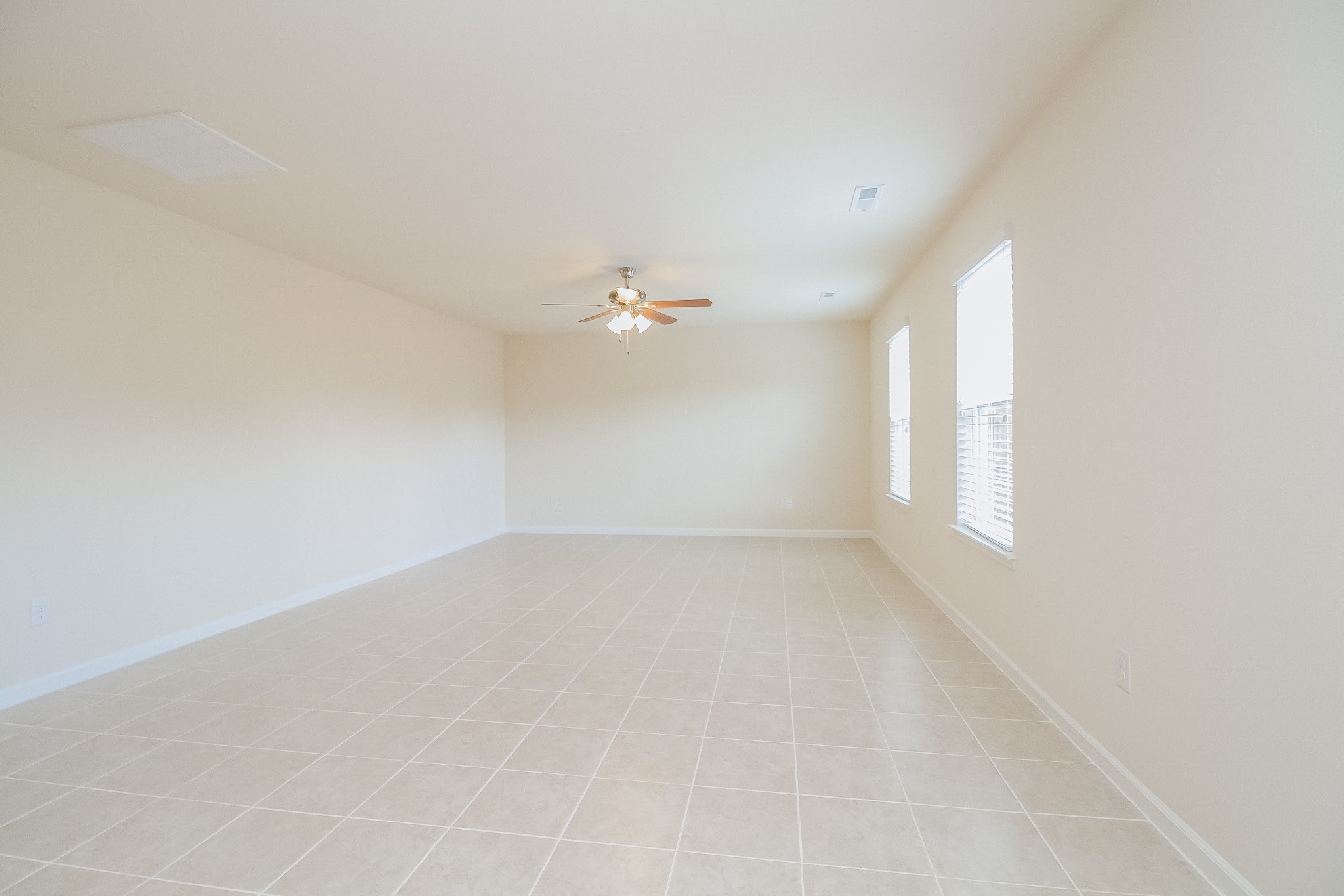 3309 Marichal Drive Murfreesboro, TN 37128 - Photo 3 of 15 an empty room with a window and chandelier fan