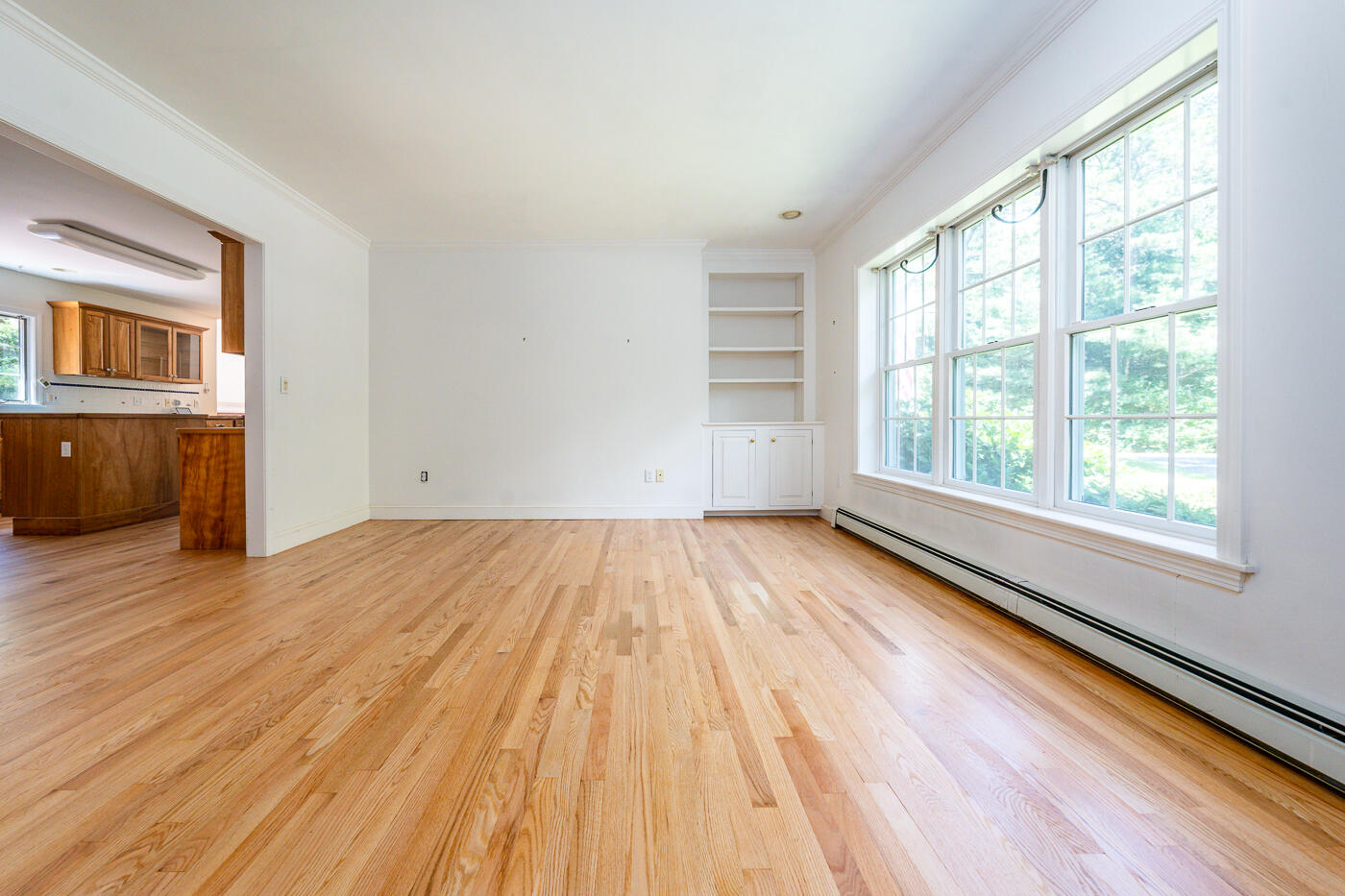 349 Little River Road Cotuit, MA 02635 - Photo 13 of 67 wooden floor in an empty room with a window