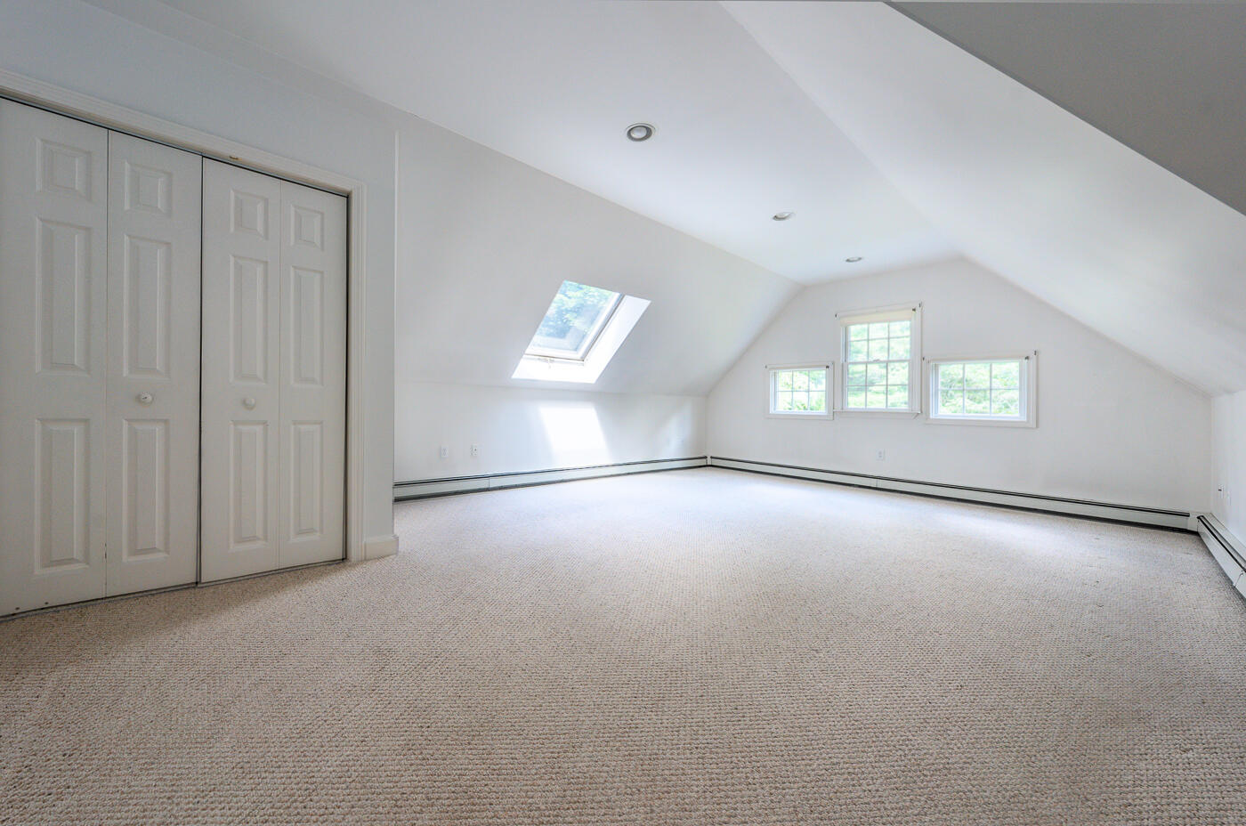 349 Little River Road Cotuit, MA 02635 - Photo 34 of 67 an empty room with windows and closet
