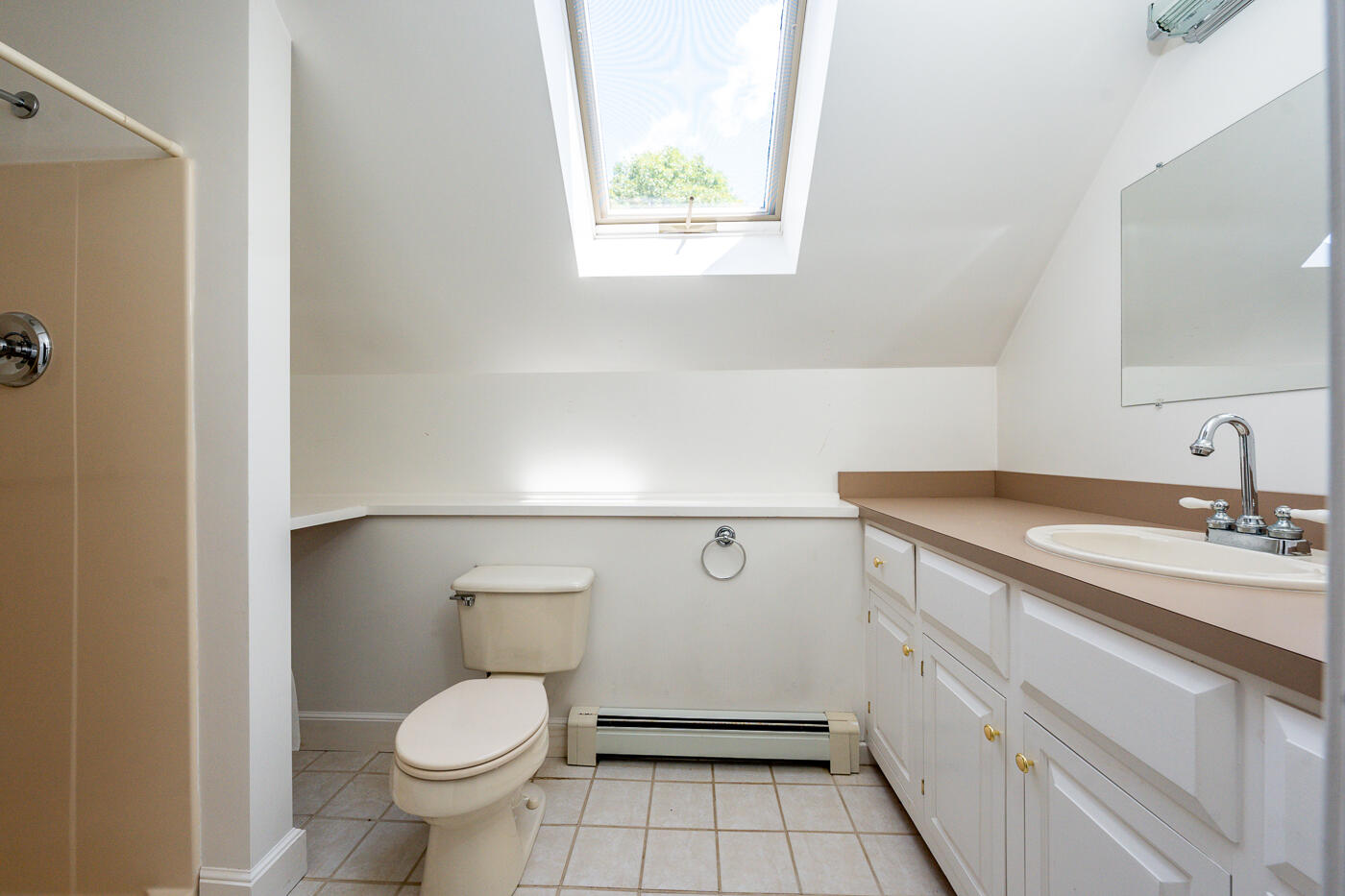 349 Little River Road Cotuit, MA 02635 - Photo 38 of 67 a bathroom with a granite countertop toilet a sink and a window