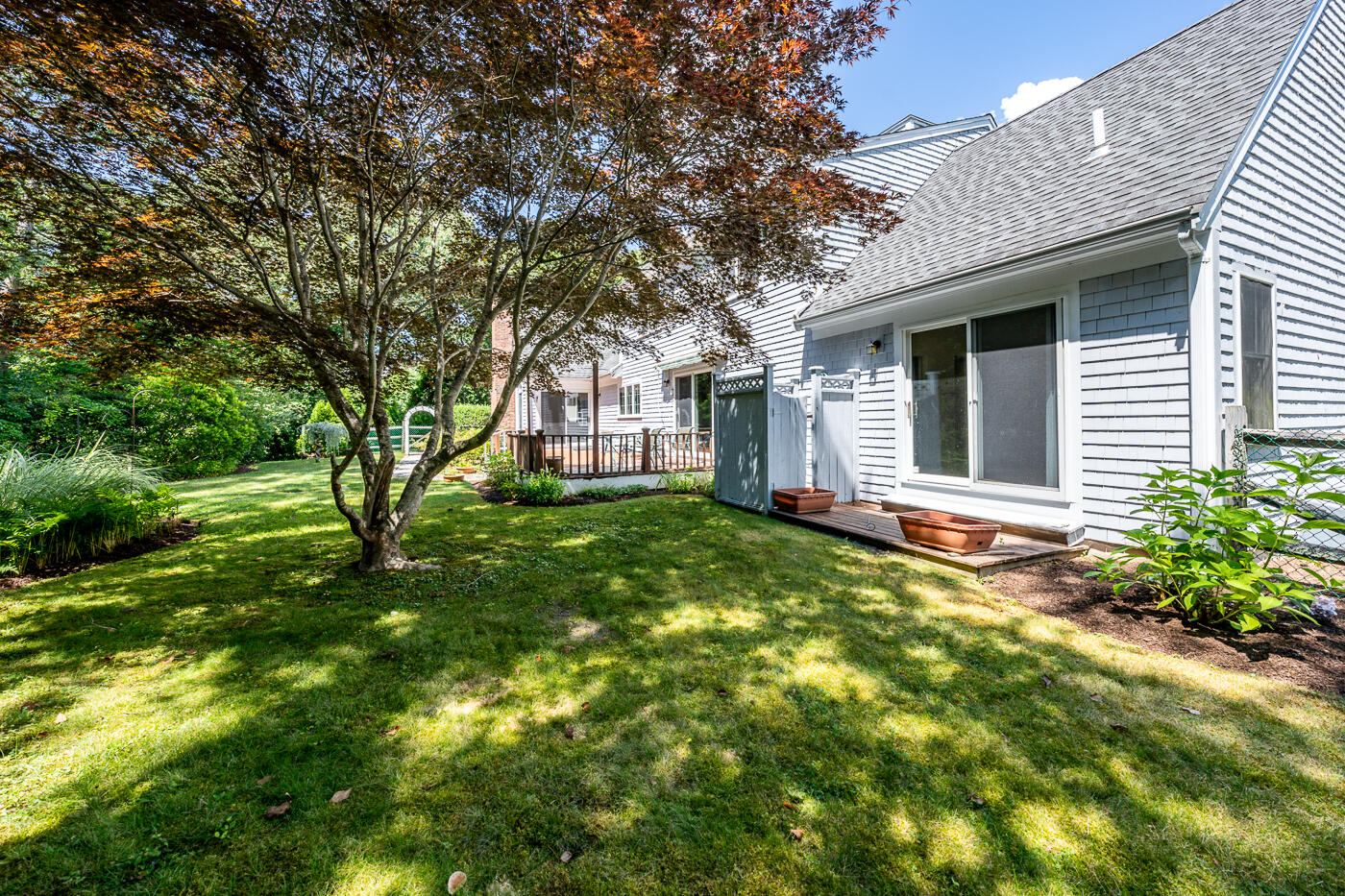 349 Little River Road Cotuit, MA 02635 - Photo 48 of 67 a house view with a garden space