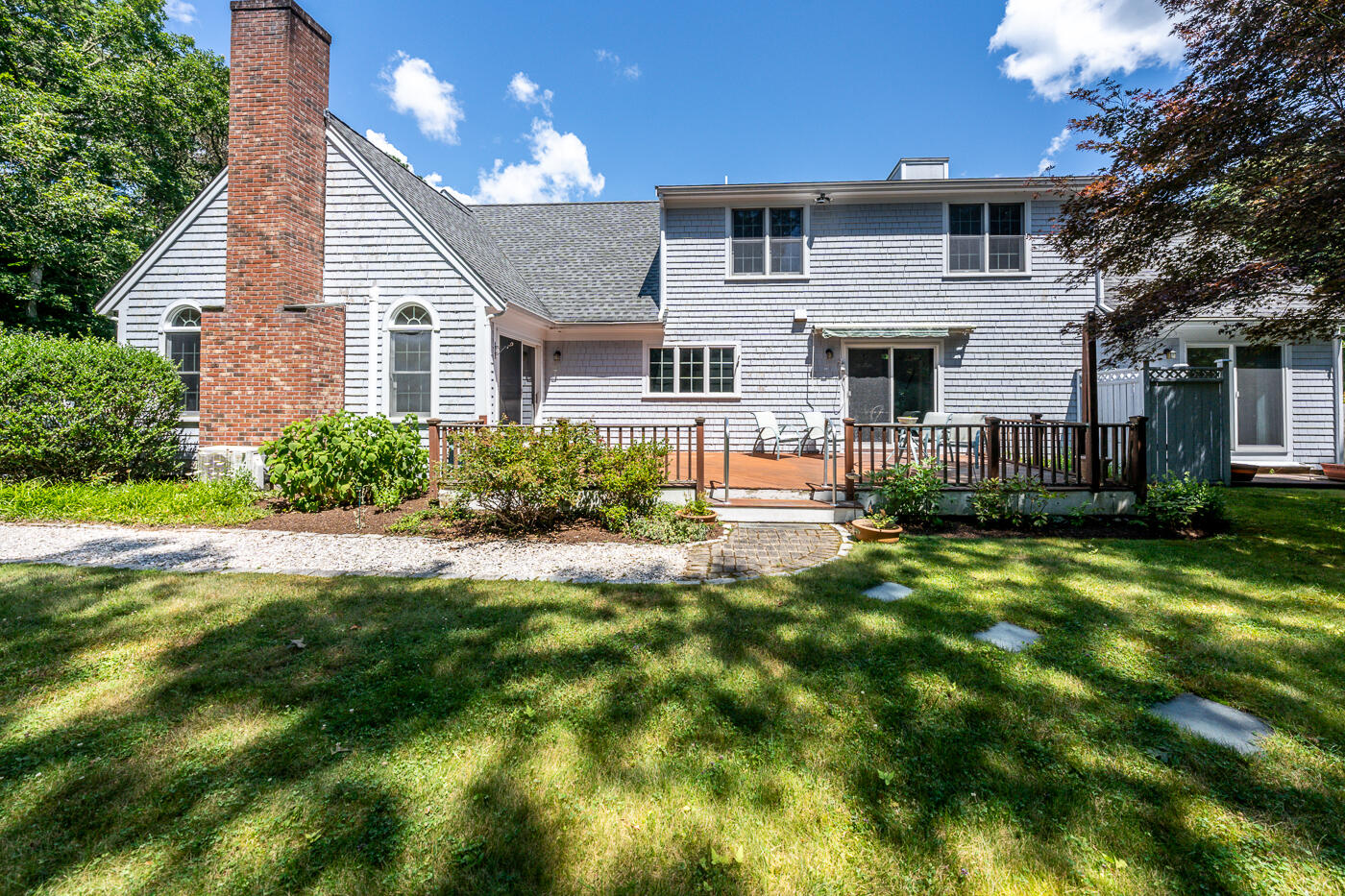 349 Little River Road Cotuit, MA 02635 - Photo 51 of 67 a front view of a house with a yard