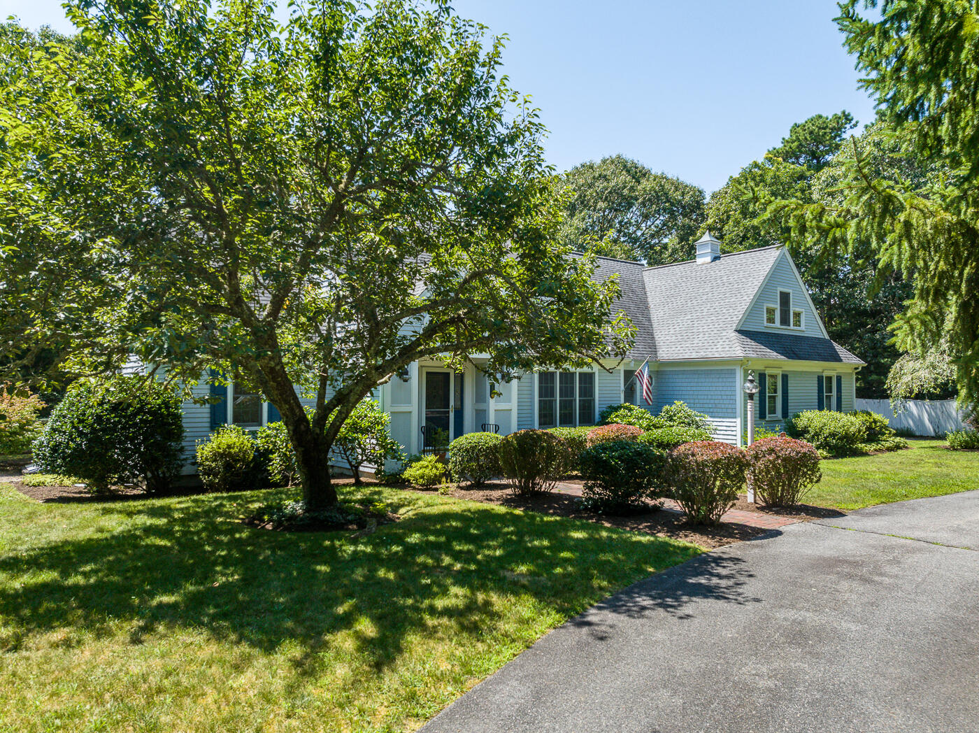 349 Little River Road Cotuit, MA 02635 - Photo 56 of 67 a front view of house with yard and green space