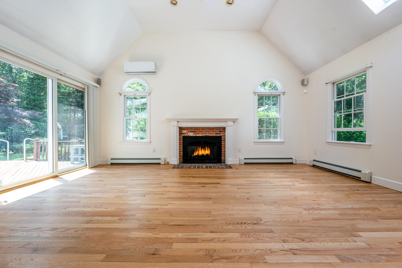 349 Little River Road Cotuit, MA 02635 - Photo 6 of 67 a view of an empty room with wooden floor and a window