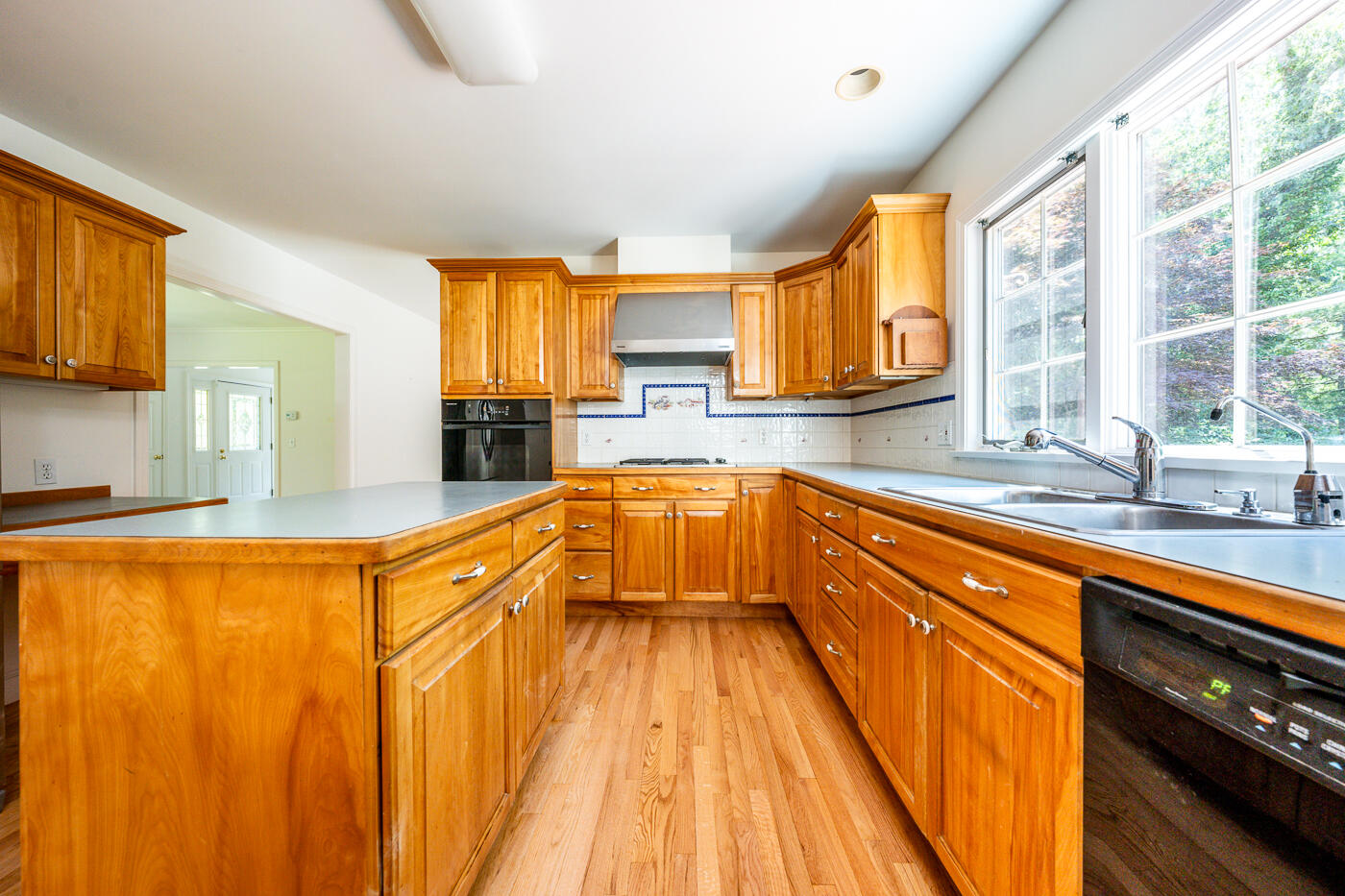 349 Little River Road Cotuit, MA 02635 - Photo 10 of 67 a large kitchen with a large window