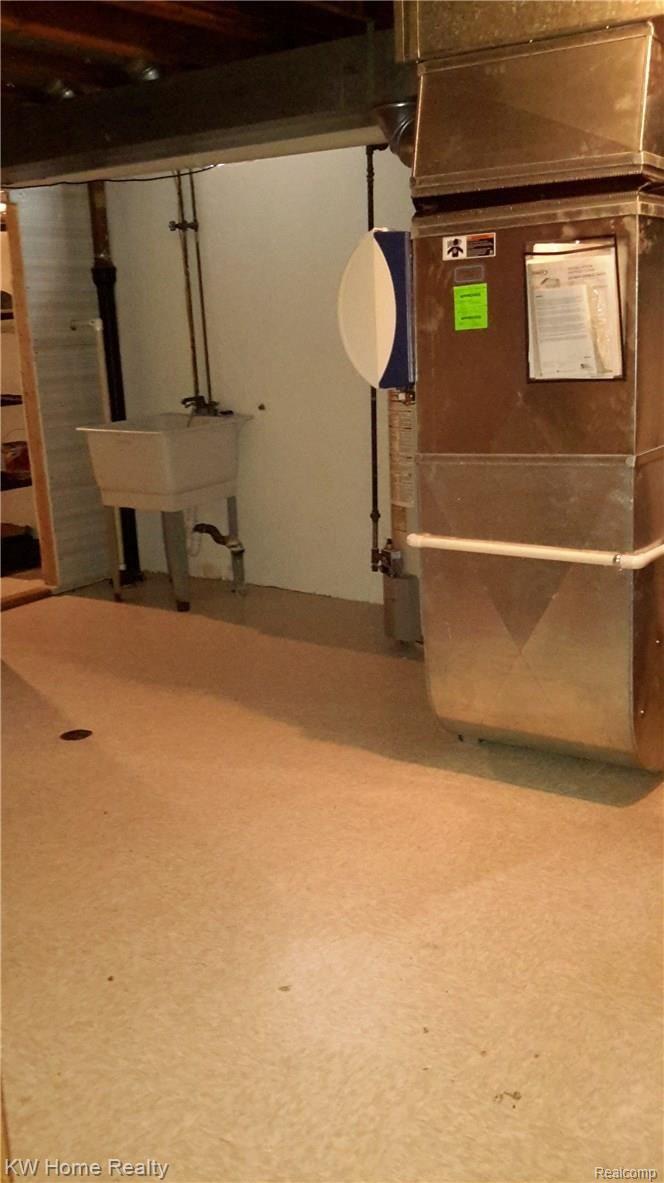25247 Branchaster Road Farmington, MI 48336 - Photo 15 of 22 Lower level utility room has plumbing.jpg