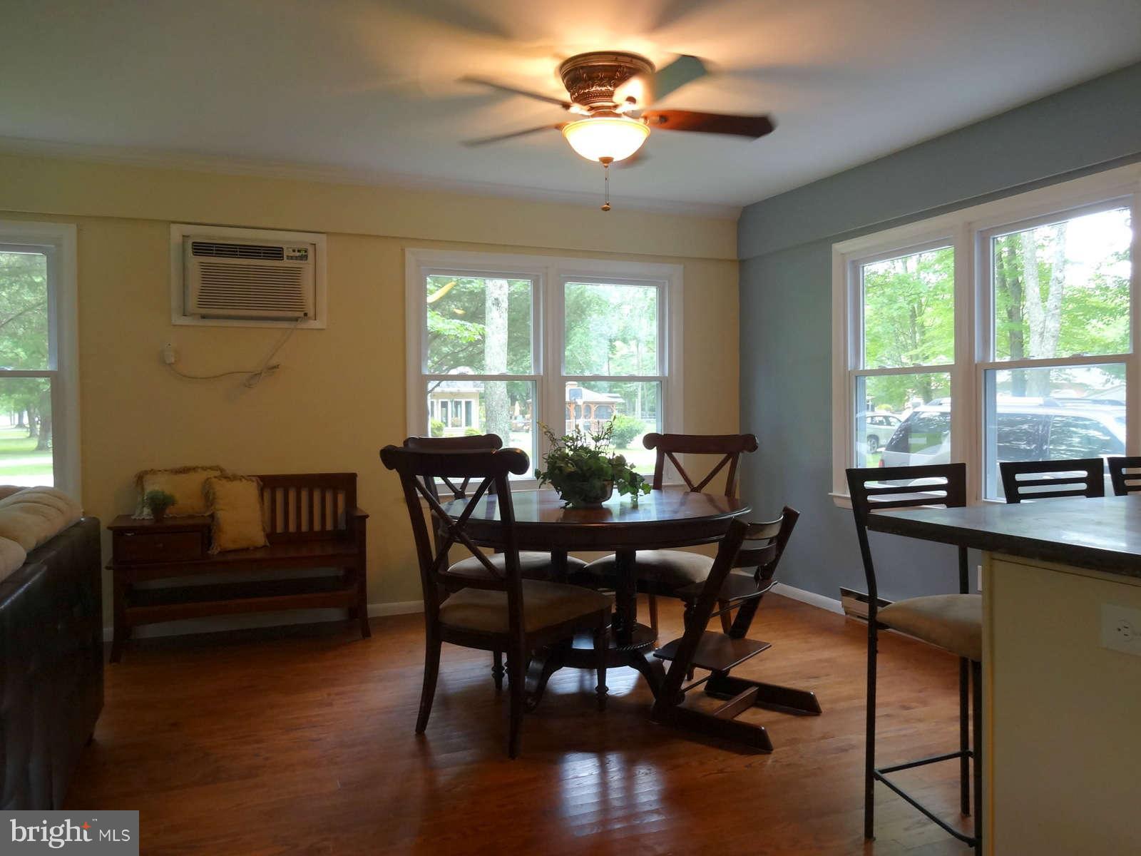 5264 Chalk Point Road West River, MD 20778 - Photo 13 of 30 Dining Area with lots of windows and crown molding