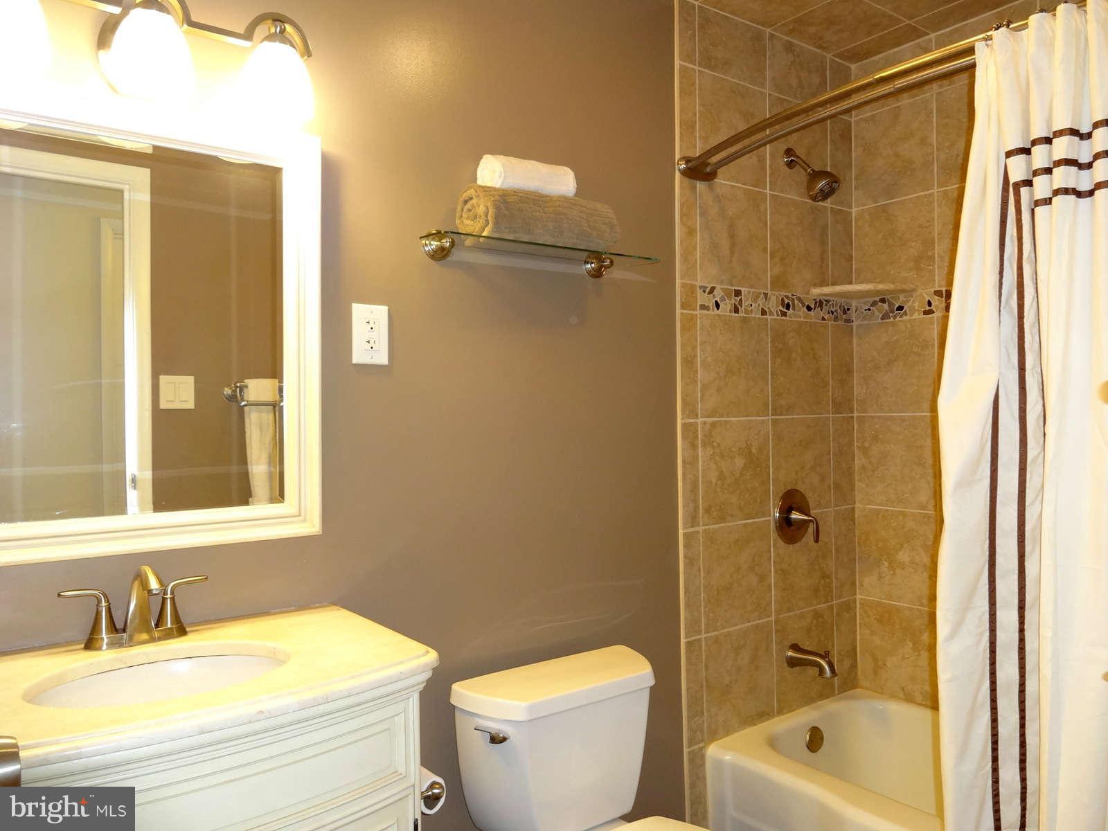 5264 Chalk Point Road West River, MD 20778 - Photo 25 of 30 Ceramic Tile throughout Hall Full Bath