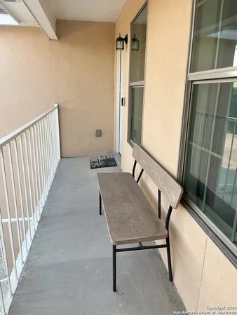 workspace with wooden floor and windows