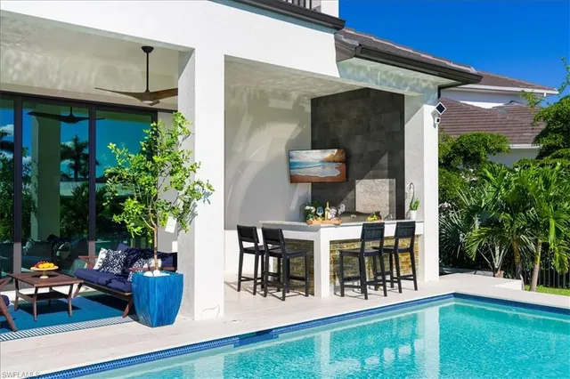 a view of outdoor dining space with a patio