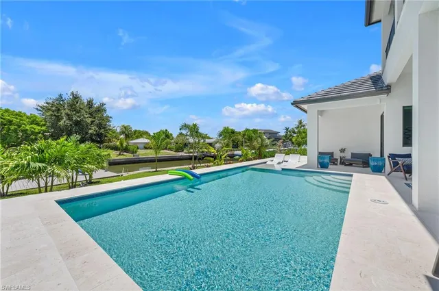 a view of outdoor space yard and swimming pool