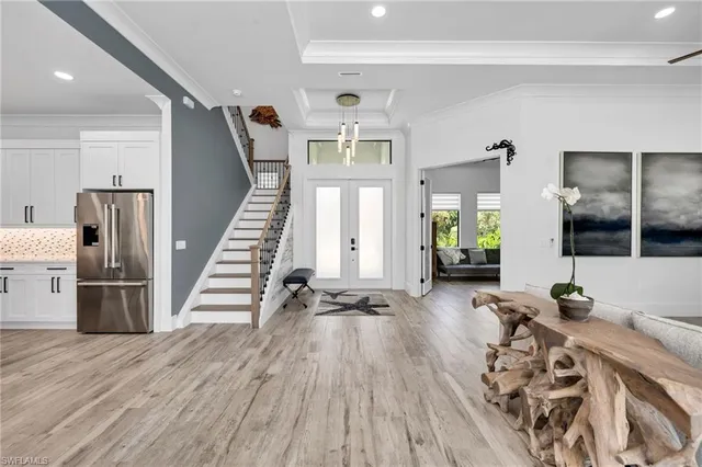 a view of a living room and dining room