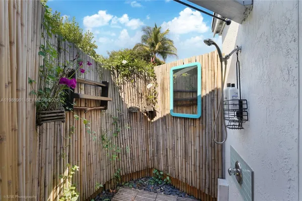 a view of a house with yard and green space