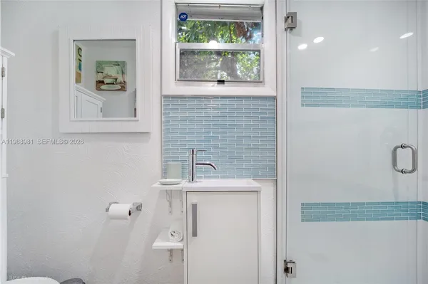 a vase of flowers sitting on a table