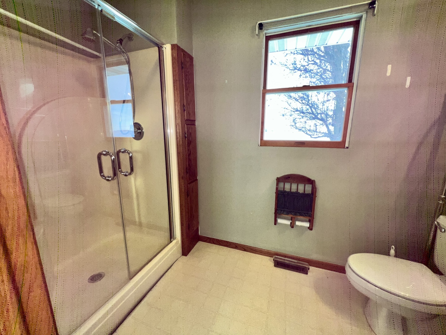 1909 County Road 2800 North Rantoul, IL 61866 - Photo 14 of 42 a bathroom with a toilet and a shower