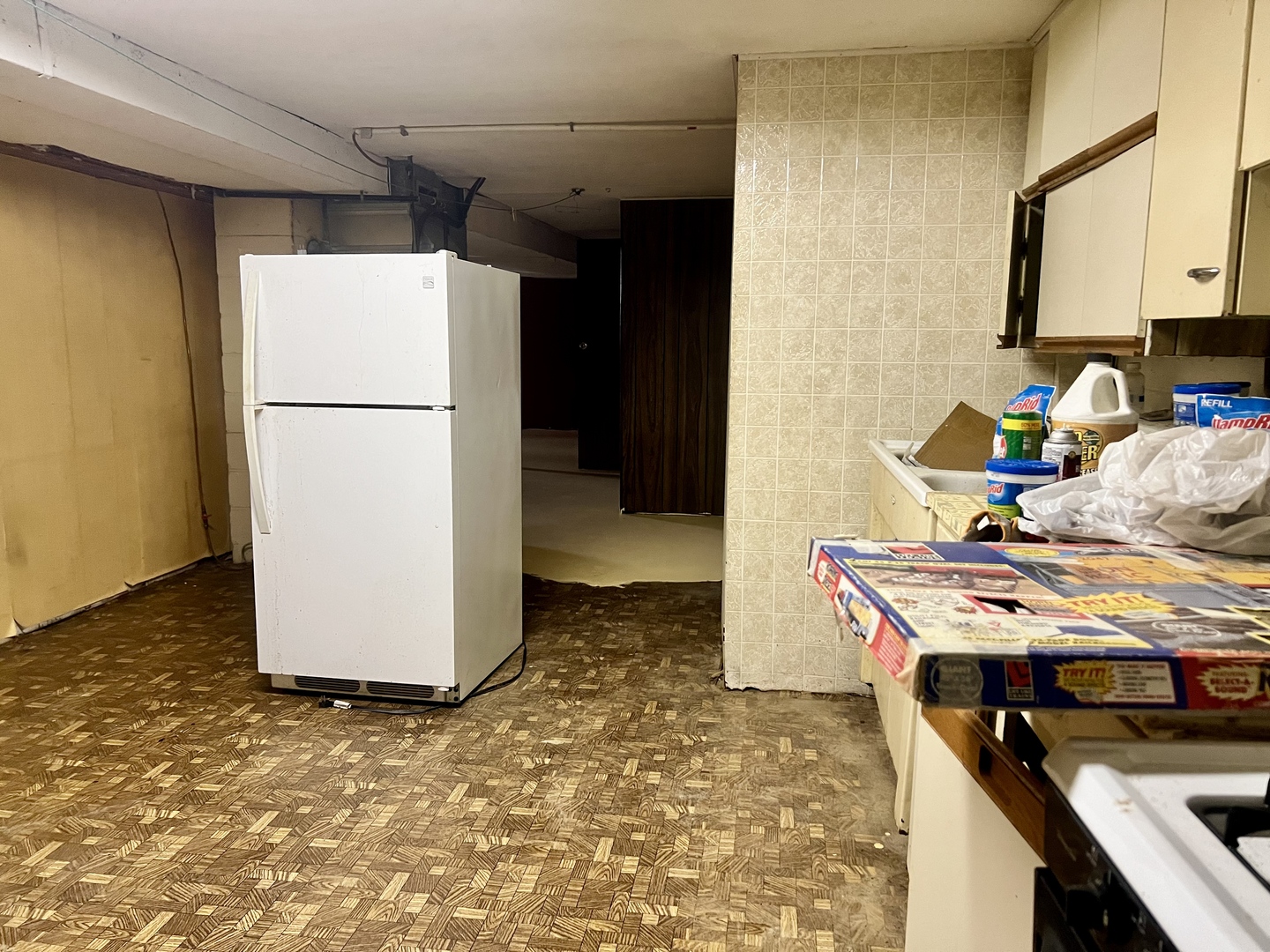 1909 County Road 2800 North Rantoul, IL 61866 - Photo 34 of 42 a storage room with a refrigerator