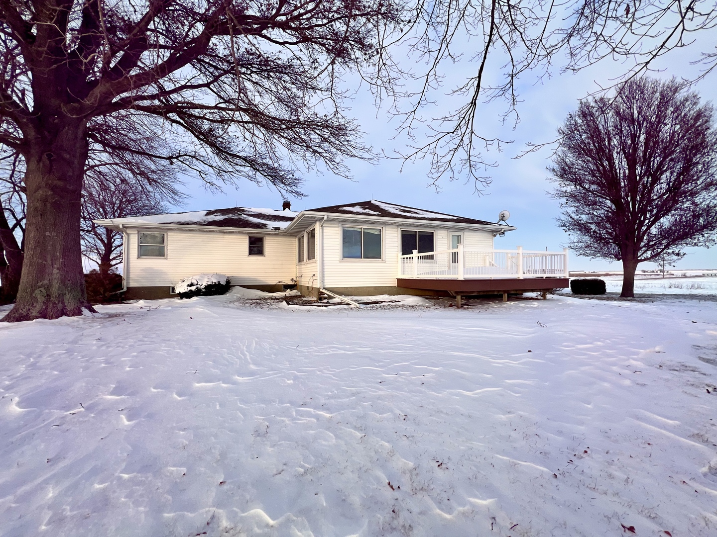 1909 County Road 2800 North Rantoul, IL 61866 - Photo 42 of 42 a front view of a house with a yard covered with snow in front of house