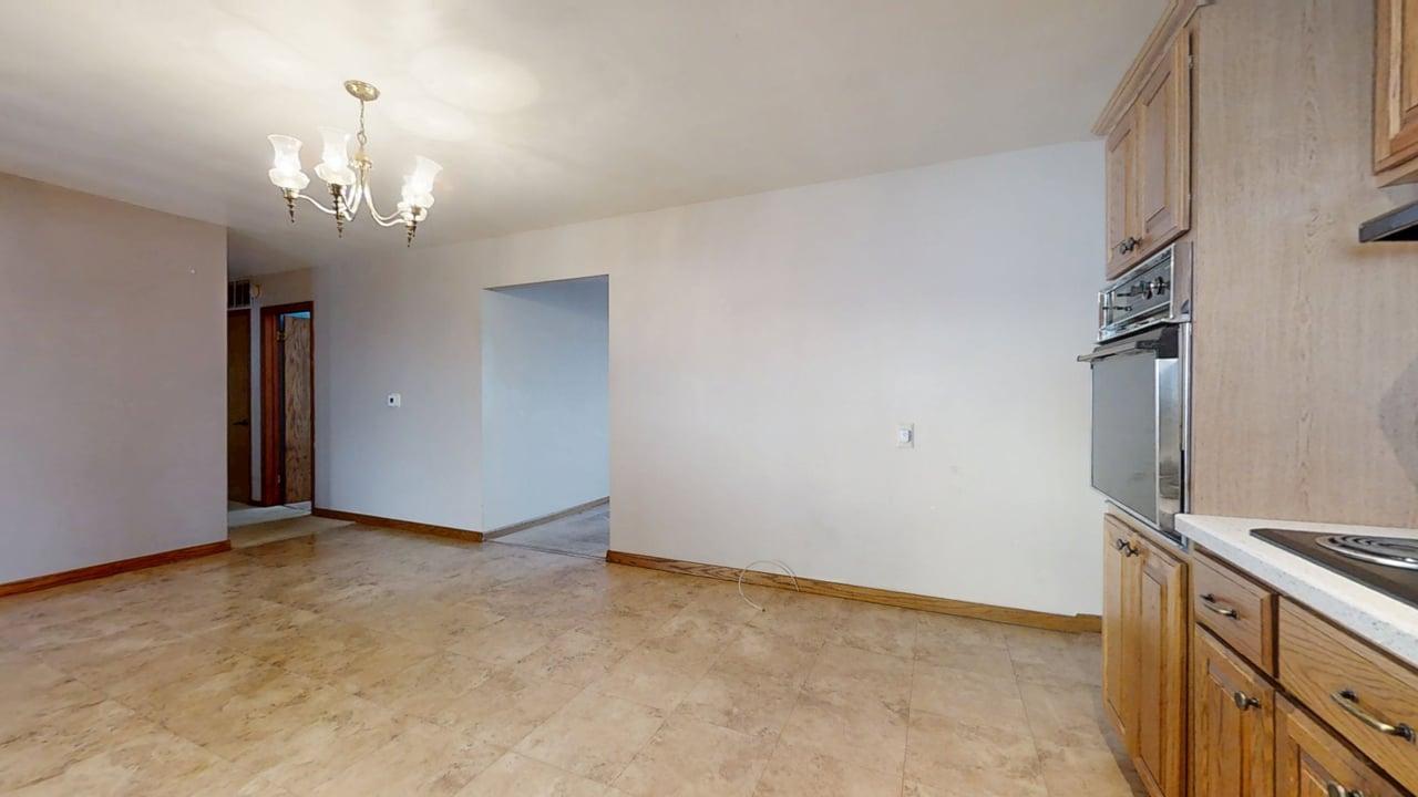 1909 County Road 2800 North Rantoul, IL 61866 - Photo 8 of 42 a view of an empty room with a chandelier