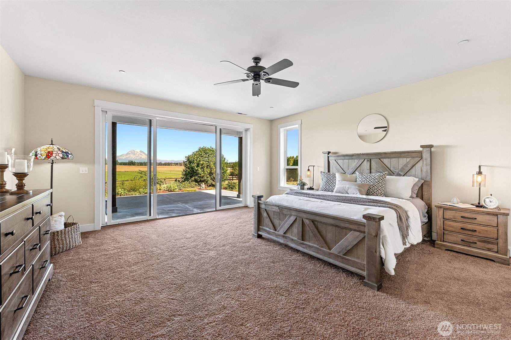 30721 40th Avenue South Roy, WA 98580 - Photo 13 of 40 a spacious bedroom with a bed and a window
