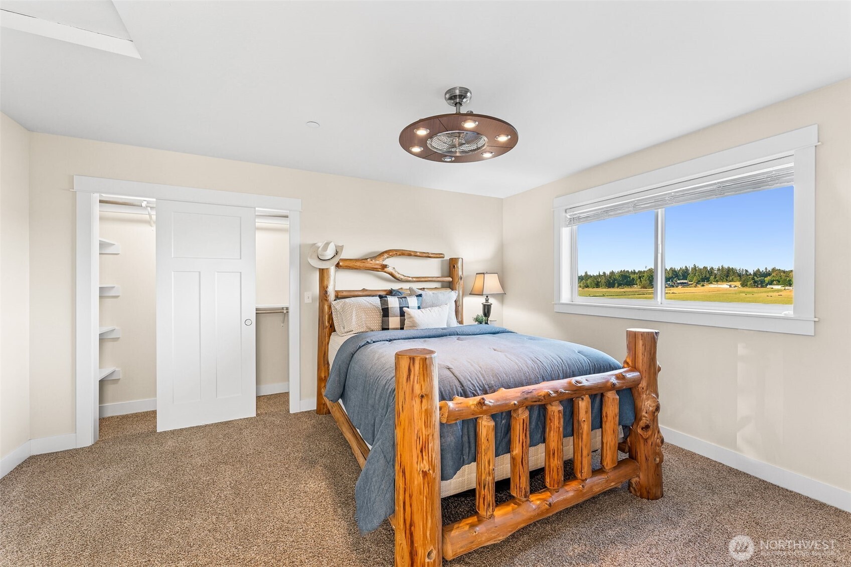 30721 40th Avenue South Roy, WA 98580 - Photo 19 of 40 a bedroom with a bed and a table