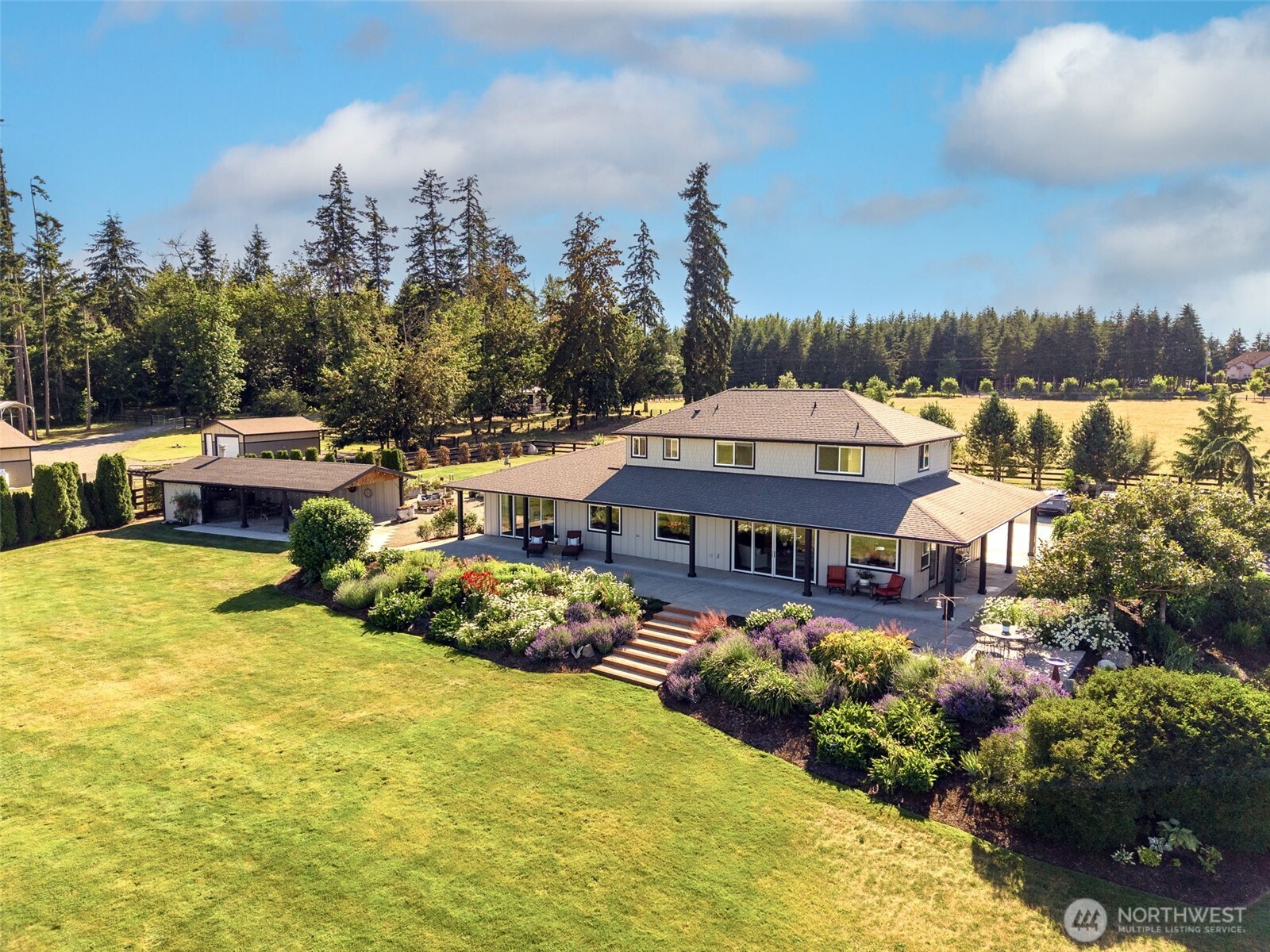 30721 40th Avenue South Roy, WA 98580 - Photo 2 of 40 a aerial view of a house with swimming pool garden and lake view