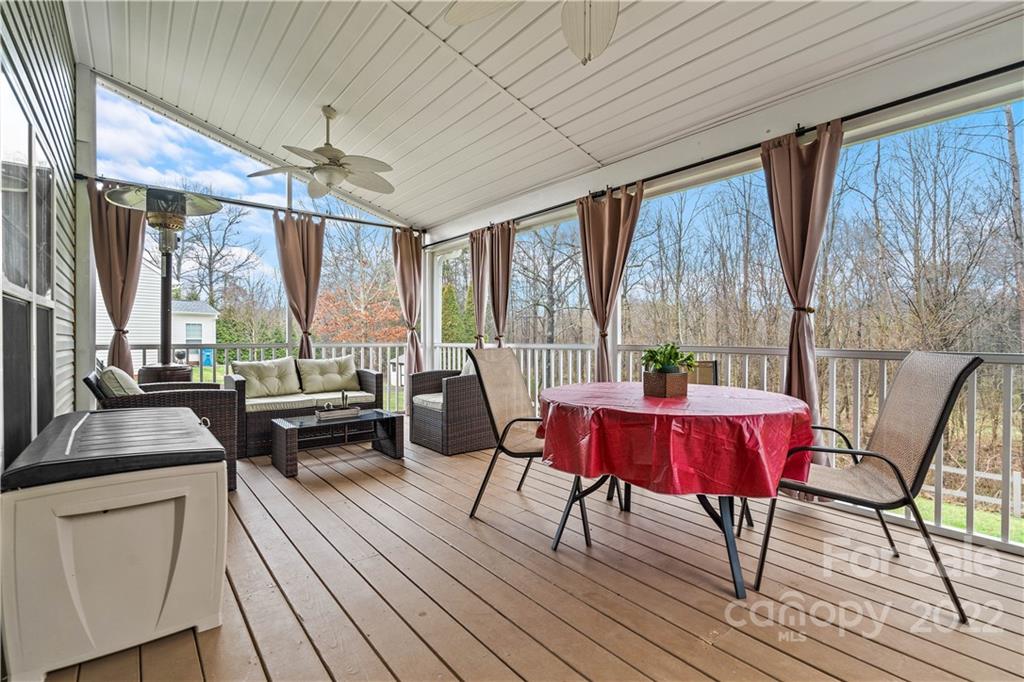 5677 Berry Ridge Drive Harrisburg, NC 28075 - Photo 21 of 24 a view of a dining room with furniture window and outside view