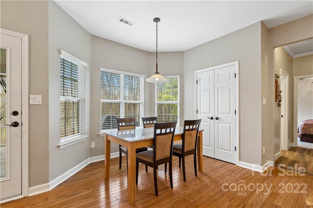 5677 Berry Ridge Drive Harrisburg, NC 28075 - Photo 6 of 24 a dining room with furniture and window