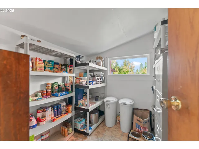 a bathroom with a toilet a sink and a shower