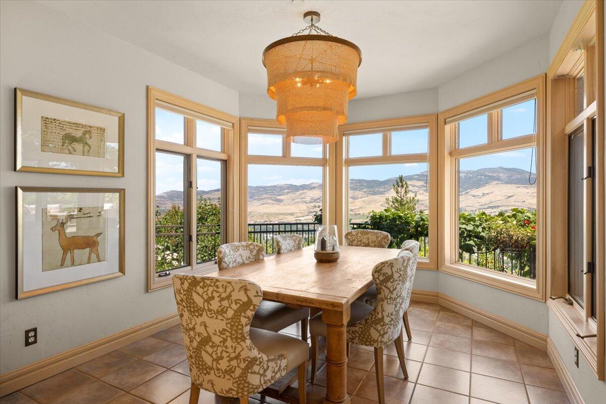 500 Ashland Loop Road Ashland, OR 97520 - Photo 19 of 67 a dining room with furniture and large windows