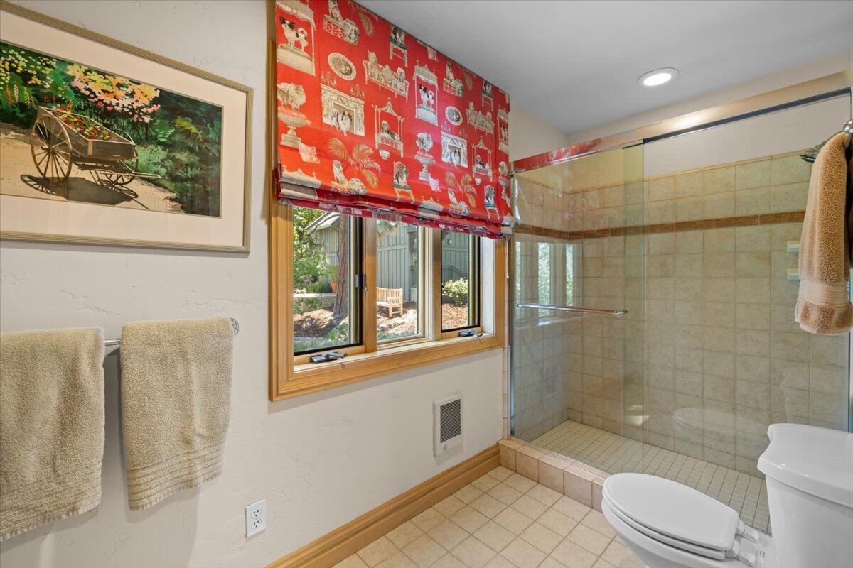 500 Ashland Loop Road Ashland, OR 97520 - Photo 38 of 67 a bathroom with a toilet a sink and a shower