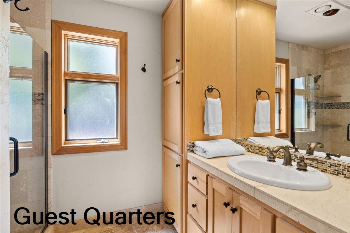 500 Ashland Loop Road Ashland, OR 97520 - Photo 51 of 67 a bathroom with a sink and a mirror