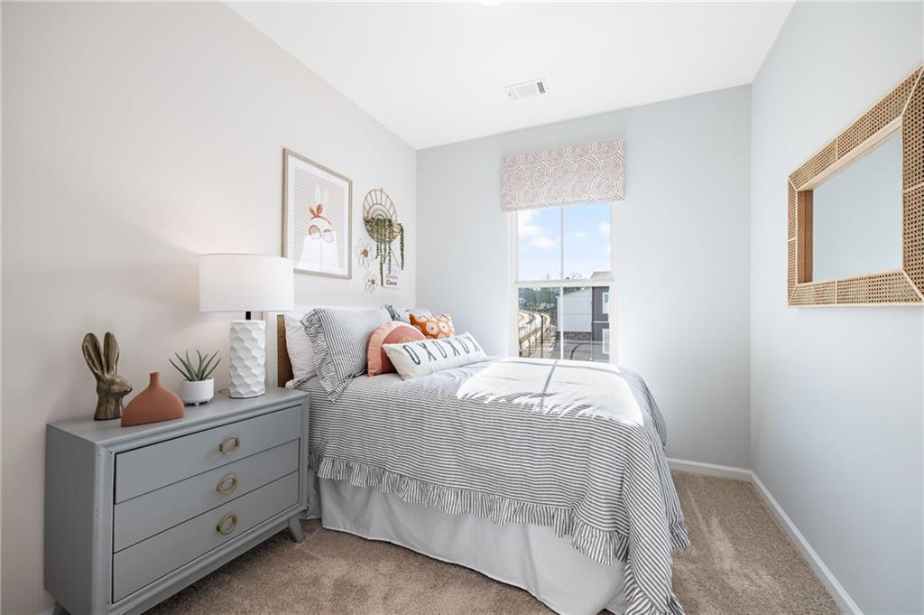 801 Cameron Trail Acworth, GA 30102 - Photo 29 of 36 a bedroom with a bed and a window