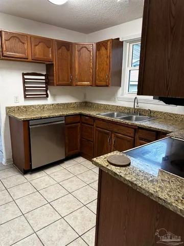 a bathroom with a sink and a shower