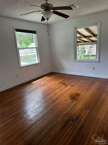 a bath tub sitting next to a shower