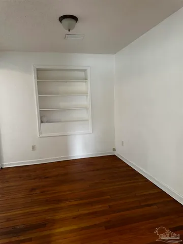 a view of a back yard of the house