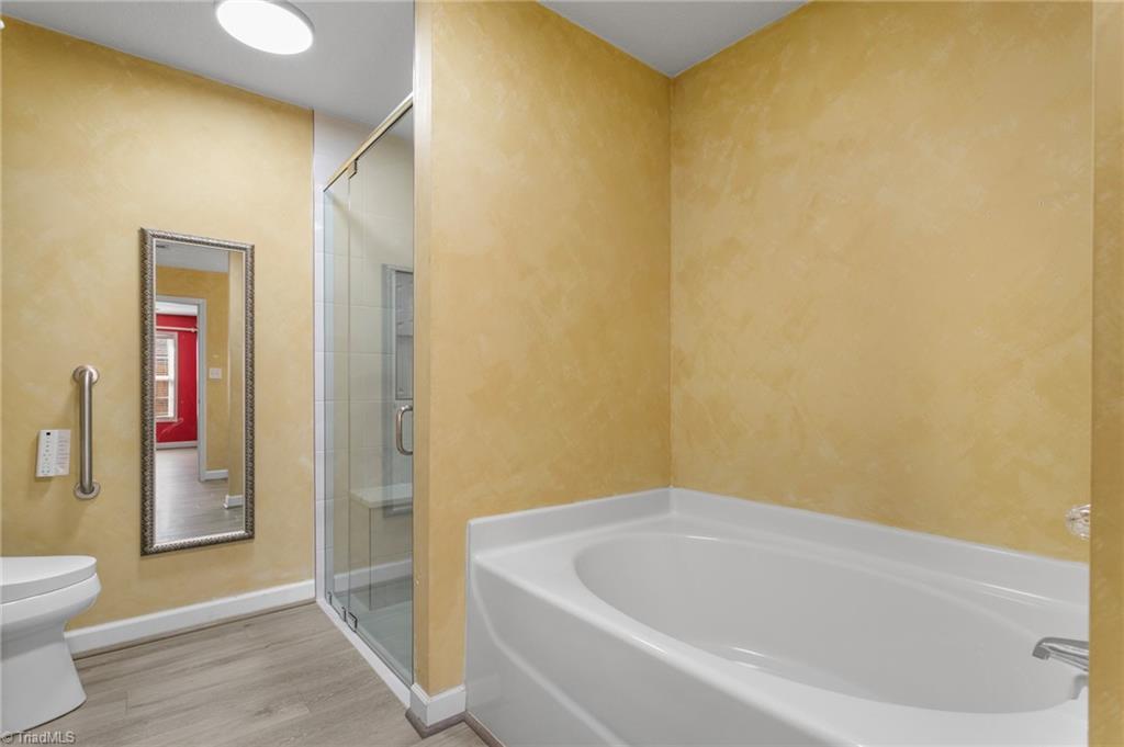 609 Huntingdon Street Elon, NC 27244 - Photo 14 of 25 Primary Garden Tub