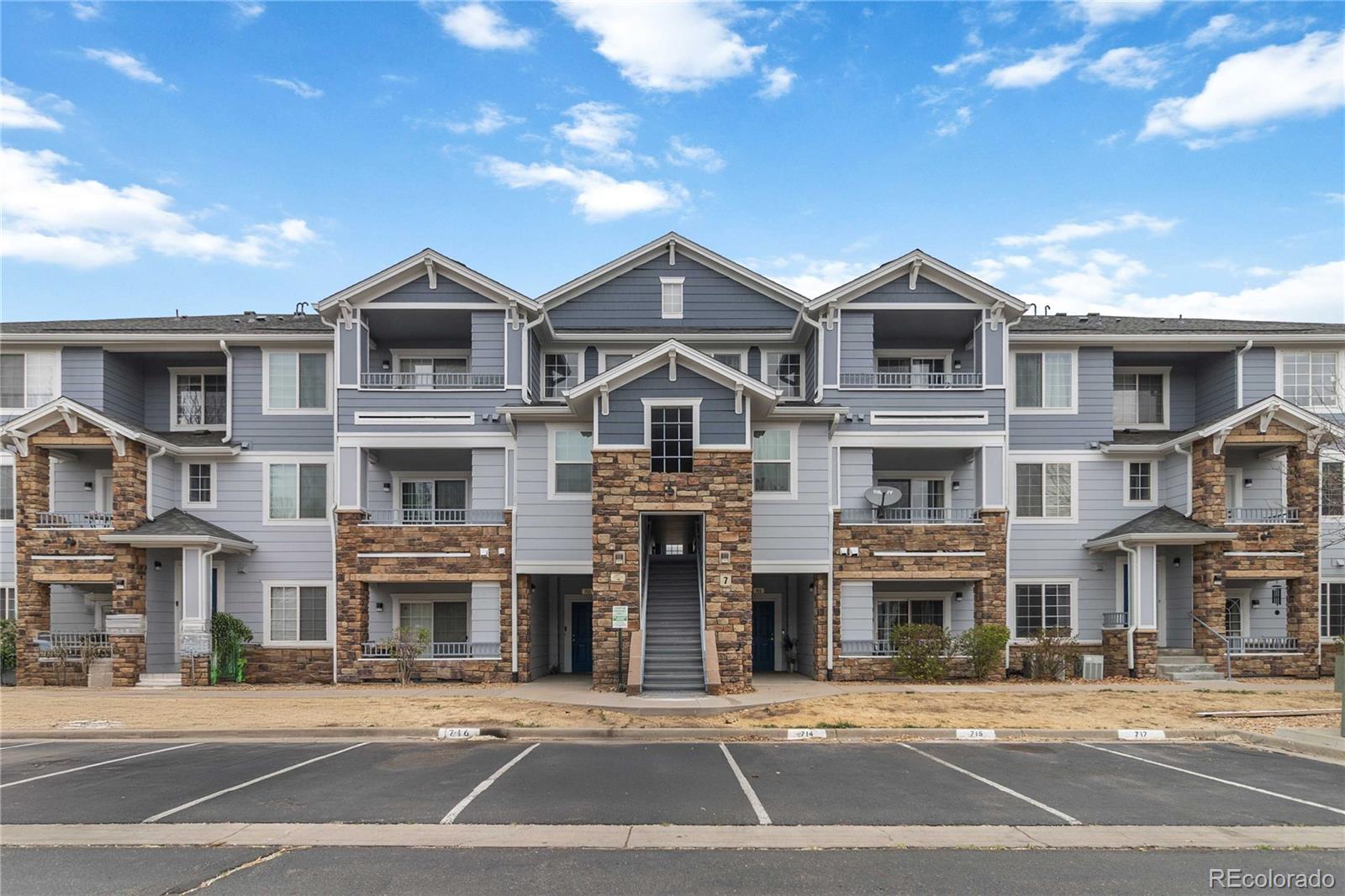 5255 Memphis Street, Unit 702 Denver, CO 80239 - Photo 24 of 30 a front view of a building