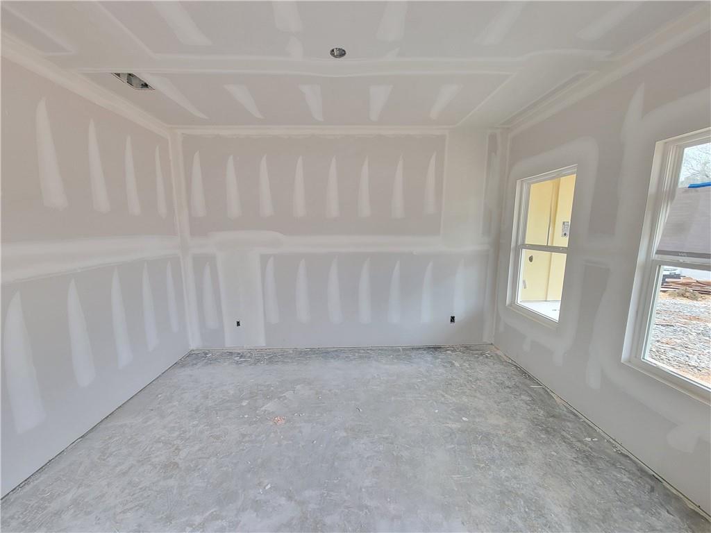 268 Silverleaf Trail Bethlehem, GA 30620 - Photo 3 of 22 a view of an empty room with a window