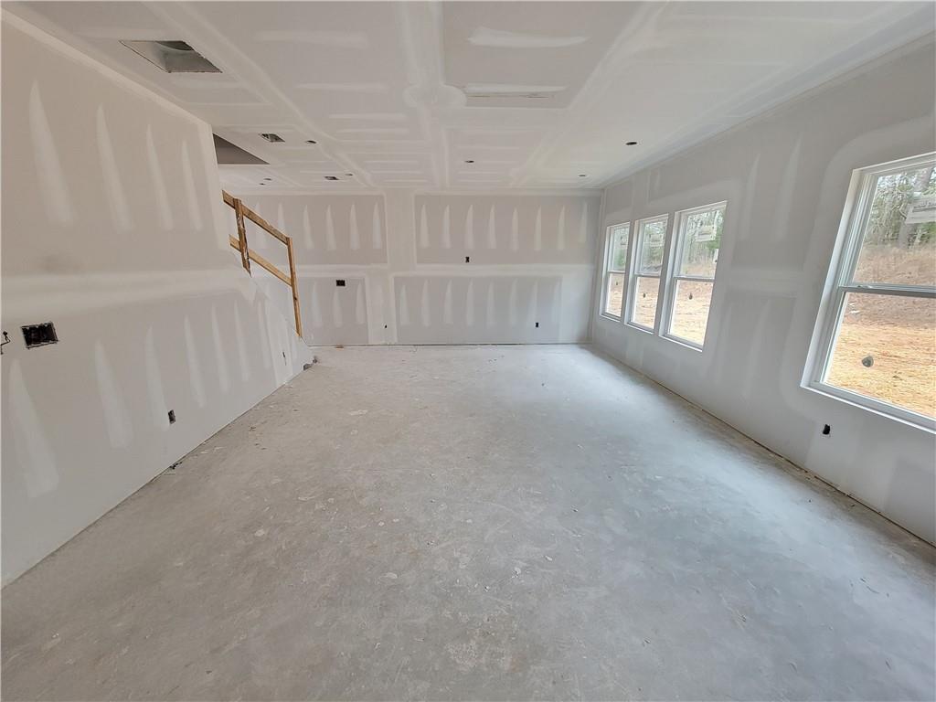 268 Silverleaf Trail Bethlehem, GA 30620 - Photo 6 of 22 a view of an empty room with a window