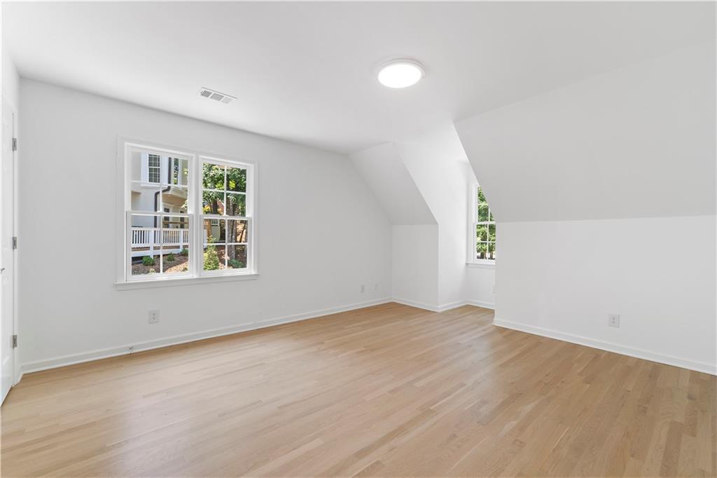 8965 Laurel Way Alpharetta, GA 30022 - Photo 41 of 79 an empty room with windows