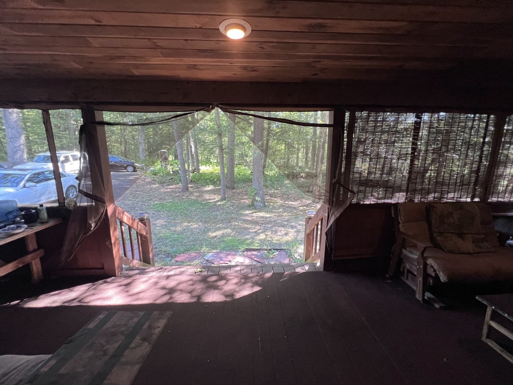 115 Town Farm Road Orange, MA 01364 - Photo 3 of 13 a backyard of a house with a table and chairs