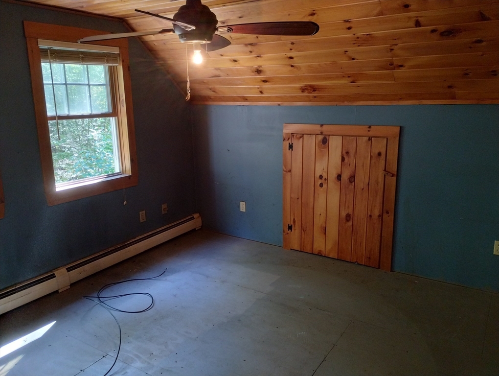 115 Town Farm Road Orange, MA 01364 - Photo 8 of 13 a view of a livingroom with furniture and window