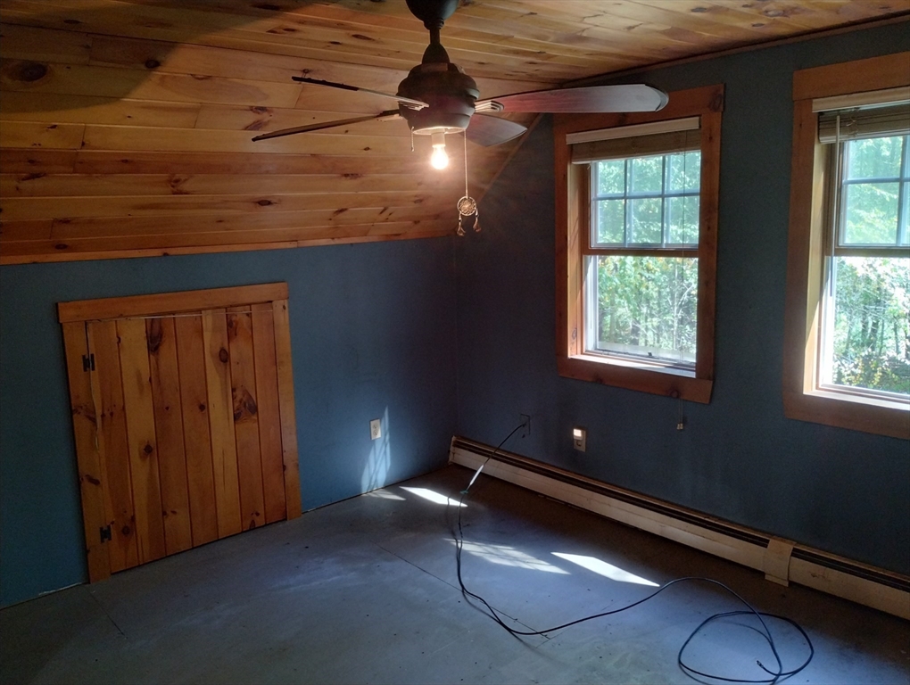 115 Town Farm Road Orange, MA 01364 - Photo 9 of 13 a room with gym equipment