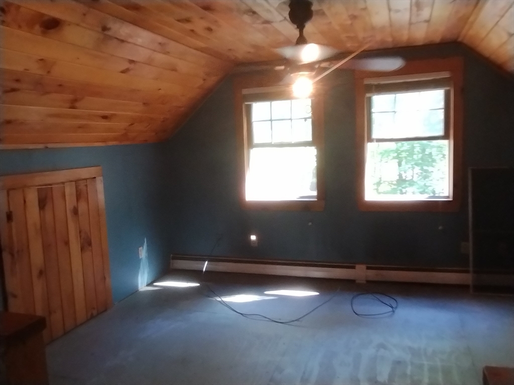 115 Town Farm Road Orange, MA 01364 - Photo 10 of 13 a view of room with window and a ceiling fan