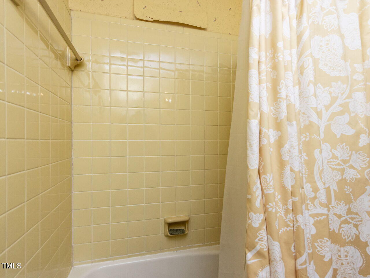 713 Macon Place Raleigh, NC 27609 - Photo 25 of 36 a bathroom with a shower