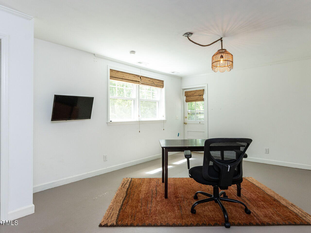 713 Macon Place Raleigh, NC 27609 - Photo 29 of 36 a view of a livingroom with furniture and a window