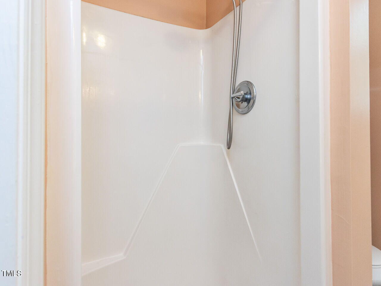 713 Macon Place Raleigh, NC 27609 - Photo 32 of 36 a bathroom with a shower